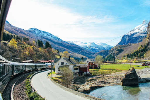 A scenic view of a small town while riding The Flamsbana: Norway’s Most Scenic Train Journey | foreignxchange